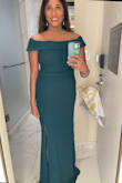This dress fits absolutely perfectly. The material is thick so it's flattering when it hugs your body. I got so many compliments on it! 

It did run a little long for me and the bottom of the dress became frayed overnight. This could probably be fixed if you get it tailored. - Riti K.