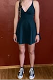 My daughter wore this dress for homecoming. Beautiful color and material. Inner lining on the skirt was a bit strange and she actually had me cut it out of the dress before she went as it was a tight, form fitting spandex type material and it kept riding up leaving a bulge in the middle. Taking it out did not affect how the dress laid or looked. I also had to attach 2 of the outermost straps together near her shoulder blades so the one would stay up. I believe someone with a larger chest would not have an issue. Overall, she loved the dress and it looked great. - Lana G.