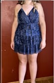 Overall the dress was beautiful. Just as the picture showed and quality of material was what we expected. My daughter wore it for homecoming. Fit perfectly with no alterations needed. - Lana G.
