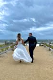 I didn't want a formal wedding gown. This was the perfect compromise. Still looked dressy and the pieces were very high quality. The flowy skirt and lace top looked really cute together. - Holly N.