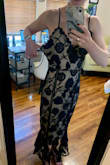 Absolutely loved this dress and got many compliments wearing it to a wedding. It fit great throughout the waist, but there was so much extra fabric around the bust I had to get it taken in. Only reason to give it 4 instead of 5 stars; the fit was off but looked beautiful after being altered. - Kelsey G.