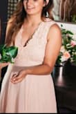 Was a bridesmaid in this dress. Very comfortable, pretty and easy to wear. - Samantha C.