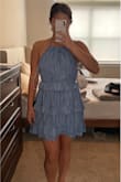 It's really cute and comfy. The fabric is light so it's great for hot weather. I was surprised that the dress has little verticals stripes. I thought it was a solid color, textured material, but still very cute! - Brooke N.