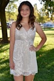 Fit was true to size. We ordered a medium and my daughter is a true medium/size 6. Excellent quality and she received many compliments. Great that straps are adjustable so she could tighten the top. Fast shipping was a perk! Only small issue we had is she wore this to homecoming dance and he under arm area developed scratches from the sequence running while dancing. Not a huge deal. Would definitely recommend. - Jamie A.