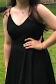 My daughter really liked the dress. I thought it could fit a little tighter around the waist. - Karen R.