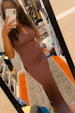 The material for this dress definitely hugs every curve! But very attractive and comfortable. The color is very complimenting and so is the price. - Carolyn C.