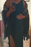 I put this dress on and did not want to take it off! The material was very comfortable and a little on the thicker side. It was perfect for the fall wedding I wore it to. I was not cold and the material being a little thicker meant the slit stayed perfectly in place all night and I wasn't giving a free show to anyone. I received compliment after compliment asking where I got this dress! - Kelsey T.