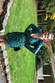 Absolutely gorgeous dress! The material is stunning, it's lined inside for a truly smooth fit. Extremely comfortable. The dress runs true to size so be sure to use the fit guide provided. I have not always been happy with clothing purchased online as it always looks better in the photo as opposed to when you actually see it, not in this case at all! This dress looks even better in person. You won't regret ordering it, it is a must have dress !! - Gilda S.