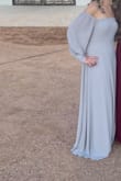 This dress worked well to wear as a guest to a wedding I went to in Texas! The dress is long! - Taren S.
