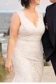 I loved the fit of this dress, although the lace was not symmetrical on the neckline, it still looked great and I don't think anybody noticed but me! Everyone that commented on the dress loved it. - Annette F.