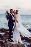 First of all, I don't ever leave any reviews for anything, but I loved my dress so much that I want to help any future brides on the fence. I used it for our civil beach elopement wedding, and knowing I would get a probably a more expensive dress in a few months when we do the religious ceremony /reception , budget was a concern but at the same time I wanted a dress that looks great for pictures. I WASN'T DISAPOINTED ! it looks very expensive, the material is gorgeous, you don't need a bra due to the shape of the bustier and you can tighten it with the straps, and the back train makes your behind looks amazing . I ordered a size up after reading the reviews and it does run a little small, I usually wear size 4 and the size 6 was tight but perfect, I wouldn't change the size . it is a dreamy dress especially with the wind. i recommence 100%!!!! - Chloe T.