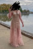 The prettiest dress ever, it was a little bit big to me originally but nothing that a seamstress can't fix! I ordered and XS - Manuela C.