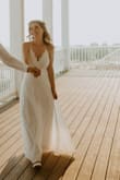 This dress was absolutely perfect for my boho wedding. I originally ordered a small because that's what I usually where, but it was too loose so I had to return it and get an x-small. The x-small fit perfectly! I only had to get the skirt hemmed a little bit because it was too long. It was pretty comfortable, not see-through, and I got so many compliments on it. I highly recommend this dress for the quality and the value. - Hazel B.