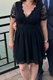 I had a lot of trouble finding a dress for a wedding, with most stores nearby out of stock. This fit perfectly, and I got a ton of compliments. The only strange thing is that when I lifted my shoulders, I felt the whole back/zipper come up and touch my neck/head; not really a problem, but I guess it was just a bit stiff in the back. Also, it required some ironing for the bottom and says it should be washed by hand which isn't ideal! - Michelle R.