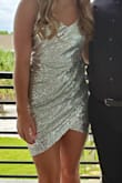 Love the way this dress looks and fits. Spaghetti straps adjust, sequins aren't scratchy and don't fall off. Great price. Recommend 100%. - Monroe R.