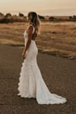 This dress fits absolutely amazing. My husband and I decided to elope last minute and I needed something quick and cute and something that didn't need alterations. I paid for overnight shipping and it in fact came overnight! A lot of companies say overnight but still take longer. I was in between getting a small or XS and I decided I'd rather it be slightly tight then loose and it was neither and fit so amazing. For the price and quality it's a great choice for anyone looking to get married quickly and still find a decent wedding dress in time! - Dana D.