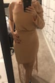 This was a spontaneous purchase, I didn't actually need it for anything but I am so glad I got it! It fits really well and is really comfortable, my only worry is washing it without ruining the fringe. - Livia J.