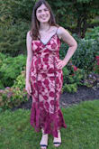 This dress is absolutely gorgeous. I wore it to a semi-formal fall wedding and it was perfect.
I didn't have an trouble walking in the dress -- but I'm pretty tall so that may have helped. 
Can't wait to wear it again! - Molly O.