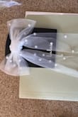 I wanted to love this but I'm pretty disappointed in the quality. The tails of the bow are uneven and there's a piece fraying off. For the price I expected much better quality. On top of that shipping was not cheap and it took a very long time to arrive. Likely will not purchase from Lulus again. - Darienne T.
