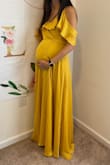 This dress fits well, is flattering, and can adjust to my baby bump (or not!). I wore it for my baby shower and maternity photos (perfect color for fall). The material is soft and flowing, I got so many compliments on the color and fit. It does run long (I'm 5'9"), and wanted it to hit the ground, but someone shorter would need to get it hemmed. - Ashley B.