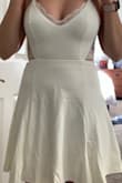 Unless you have 0% fat and a teeny tiny tummy, this dress shows everything... Not flattering whatsoever. - Shylee F.