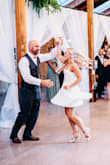 I was on the hunt for a dress for my husband's and mine first dance at our wedding. I wanted white and something fun and with a flowy skirt for all our twirls. Well I couldn't find ANYTHING, and but LOVED the top to this dress, so bought it and decided to get it hemmed! (Ordered and XS first and couldn't zip it up, and the S was great). It was PERFECT to dance it and got lots of compliments. - Natalya K.