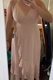 Lots of fabric lines going on in the bust area and the edges were curling to show the inside seams. I'm returning. - Gracie W.