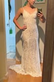 I loved this dress! The only reason I didn't go with this one is because I'd prefer a lower back and didn't want to pay to get it altered. The hem line is so unique! Can't beat this dress for the price! - Chelsea C.