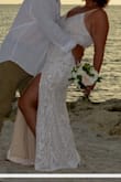 The dress is so beautiful and the length was perfect! I am 5'9" and a curvy size 14. The fabric is not quite as thick or stiff as I would have liked, so I wore spanx underneath to smooth my curves. It was perfect for my beach wedding. - 5 R.