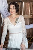 Love love loved wearing this dress on our special day! Fit beautifully, felt wonderful and looked amazing! I got so many compliments and felt like a princess. Was very nervous to order but so very glad that I did. - Melissa B.