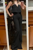 I was concerned about keeping my chest in the top, but all the reviews helped convince me. This fit perfectly, was very flattering, and I didn't have any issues with the top, even after several hours of bending and reaching. The legs are looong, which was great for my long legs but I still had to wear heels to keep the bottoms from dragging. Lots of compliments, this was a great purchase - Nadine S.