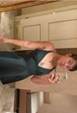 Dress fits great, my only concern is that I have wide shoulders and the outside straps sit a little weird, but I doubt many people have 17" shoulders at 5'0".

You'll look great in this dress for cocktail hour! - Zwei G.