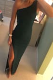 The dress fits me perfectly. Finding dresses that fit my are sometimes hard because I don't like them too tight, this one is tighter at the top which is good because I am flat chested and the slit gives some room which is perfect because I have smaller hips. - Christie C.