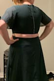 Beautiful dress! Don't hesitate about the opening in the back because it is beautiful and falls in a good spot! The slit is the right height in the skirt too. It's a smidge tight above the back opening as opposed to under the back opening that is loose! Still good though! - Erica P.