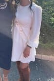 I love this dress! I got this dress to wear for my bachelorette party and everyone loved it! I adore the puffed sleeves and how it flows from under the boobs making the look very flattering. It's a great material with a slight stretch to it. - Megan T.