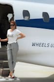 I am so glad I bought this tee! It was the perfect thing for kicking off our wedding weekend! Our small group really got in the party mood and it looked great in photos getting off the private jet we chartered!
As other reviewers said it fits a bit large but that was perfect. I tied it on the side and got retro with red lips, houndstooth, and white patent peep toes! - Veronica L.