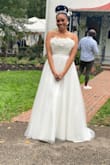 The dress is absolutely beautiful! They said it fits best for A-C cups and I'm a DD so I order two dresses to big so I'd have more room in the bust area but it's still on the smaller side in the chest but everywhere else it's perfect! Absolutely love this dress and can't wait to walk down the aisle in this dress 

UPDATED: I got married October 10th ,2021 and my dress couldn't have been more perfect ! I did have to get the sides taken out because I am larger chested but other than that it was the perfect length I even wore heels and it still covered my feet! 11/10 absolutely recommend - Brie J.
