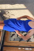 Very nice party dress.  It is comfortable and flattering.  The straps were a little too long.  I ended up seeing them together so that I'm the back, it looked like they cross. - Isabel V.