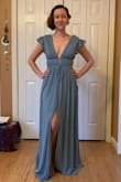 This dress is so comfortable and flowy-yet striking and elegant! The top is lined with super soft satin-y material (so no chafing lol) and the sleeves are not too puffy or awkwardly sized. My only qualm is that the skirt slit is slightly awkward to walk in as it is in the center of the dress instead on on one side. - Sophia C.