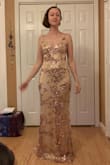 I couldn't say no to this dress. I love the rose-gold color and the sparkly glam vibe of this dress! The sequins are sewn into a layer of plastic lace that is VERY delicate. I'm wearing this to a wedding but fully expect that over the course of the night it will snag on things and that will likely stretch out/break the lace. Still worth it though. - Sophia C.