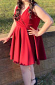 This dress was beautiful.  Bought for HoCo, but will likely get many other uses from it.  Dressed up with heels, it's elegant and sophisticated.  With sandals, fun for a dinner out with family or friends.  The material hangs very flowy and the skater type skirt is complimentary of all figures and is not too short.
Very appropriate length for all ages. - Sherryl K.