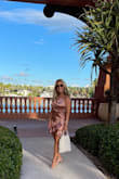 I can't believe how many compliments in one night!! I wore this for my birthday trip (52) and it was perfect! The color is like rose gold and the Satin is soft with the perfect shine!! I would have liked it a tad longer because it hiked up when I walked but none the less it was perfect! - Sharon