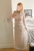 Very good quality, beautifully made dress. Lovely train. I ultimately decided to go with another Lulus dress that I felt more comfortable in (post baby). - Katina