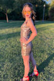 My daughter picked this dress for Homecoming. She is very thin and lean, so we had to have the dress altered. We had the straps shortened, the length shortened about 2 inches and the waist taken in about an inch or two. It ended up fitting great after that. She said it was comfortable and she looked great in it. - Emily S.