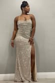 I loved this dress! It fit perfectly, I was skeptical at first because I was searching for a silver gown and found this one instead. I didn't think I would like it but as soon as I tried it on I fell in love. The material was soft, it wasn't too long, and it fit like a glove. Make sure you keep the strings in the back tied tight. - ASHLEIGH H.