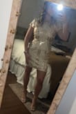This dress is so beautiful and flattering. It is perfect for special occasions and holiday parties. The material does not have much give so if in between sizes size up. - Kaelin R.