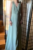 We ordered this dress for my 13 year old who will be in her older sisters wedding in 8 months. She didn't want a "jr bridesmaid" dress, and We wanted something that didn't make it look like she was trying to be a 20-something. This dress is perfect! Styling is modern and elegant, and the Swiss dot texture gives it a more age-suitable look! I love it, and so do both daughters! Will be having it altered closer to the wedding date--most likely she will grow and change before then. - Katrina B.