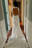 This dress is great! After going to multiple shops I have chosen it to be my wedding dress. I have received great feedback from others. The train and back are very beautiful, as is the lace chest. I ordered an XS and it's tight, not too tight though and I'm very small. It will need to have cups added to it. - Dijah J.
