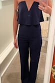 I wanted to love this jumpsuit SO badly. It fit like a glove& from the chest down. I am a member of the IBTC, and although it has grippys along the inside, it still fell down as I walked/moved.. so sadly had to return. Otherwise, it fit perfectly, and was very flattering.. the length was a touch too long but would be perfect with heels. I highly recommend still, if you have a larger chest than I do. - Rachel S.
