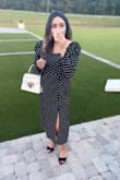 I originally bought a Large and it fit perfect everywhere except my chest. Too tight. Then I ordered a XL and it was huge everywhere except chest. I loved the dress so much I took it to tailor. So many compliments. I wore it to a wedding. Nice material and very flattering. - Wendy A.